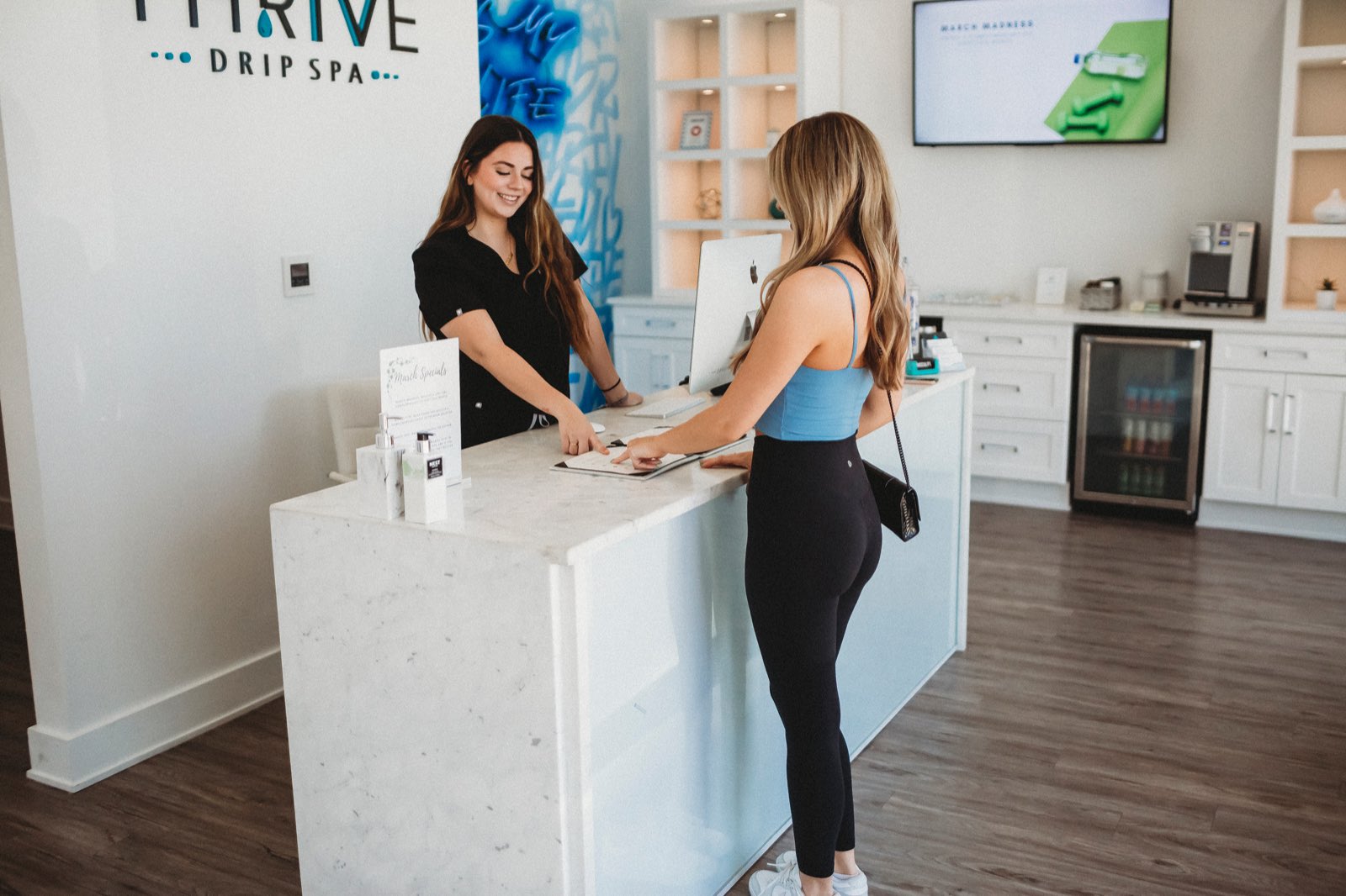 A guest checking in at ThrIVe Heights